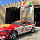 A car outside the AAA Rego and Repair workshop